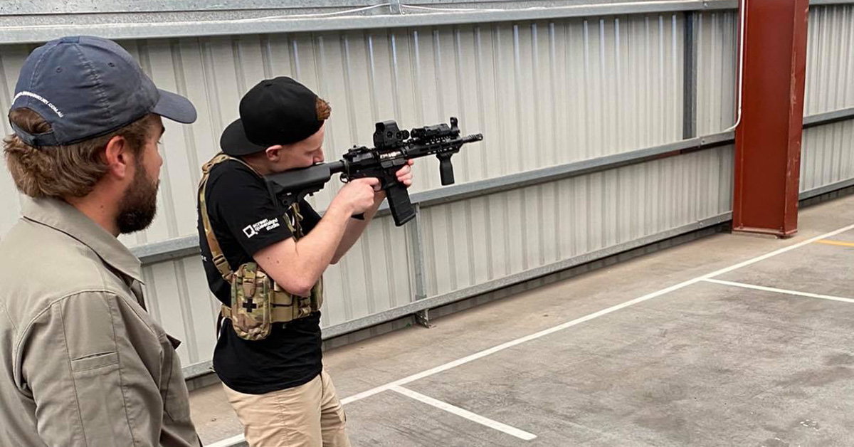 Screen Combat Safety student firing AR-15