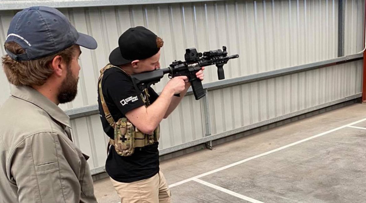 Screen Combat Safety student firing AR-15